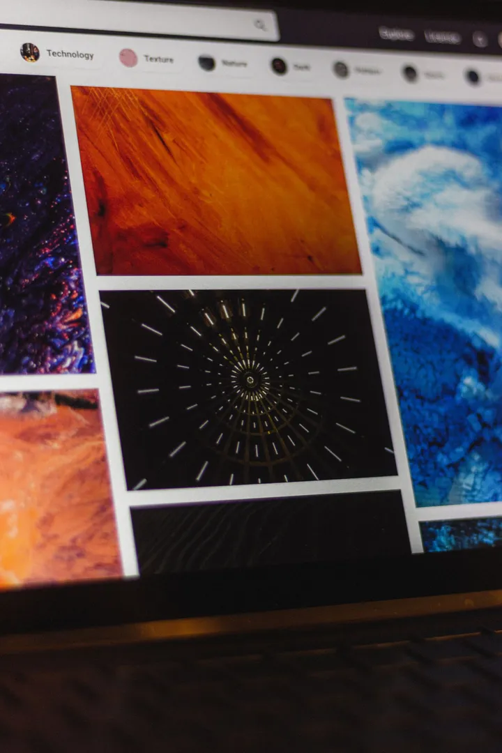 Laptop showing a browser search with a magnifier icon