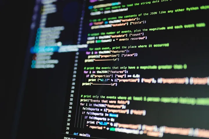 Code on a monitor representing applicant tracking system infrastructure