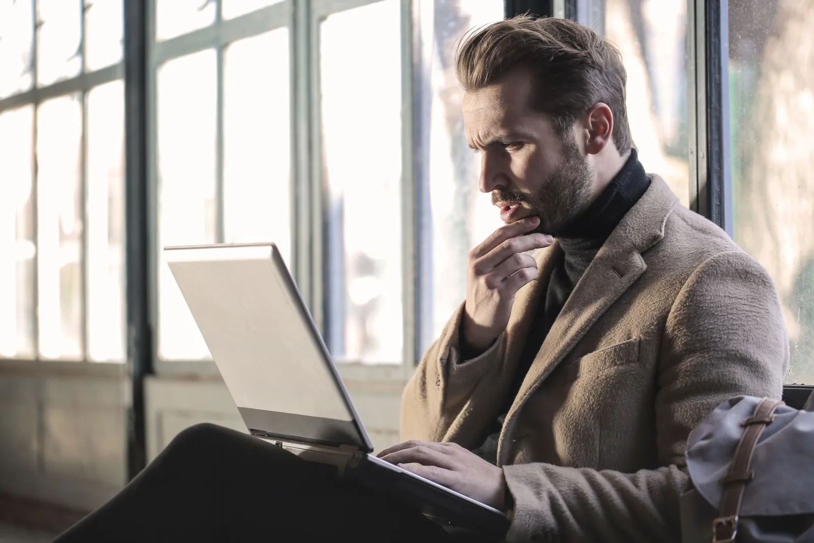 Thoughtful professional working at a laptop — the tactics that actually survive scrutiny