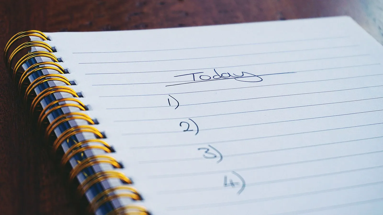 Handwritten numbered list in a notebook — the least glamorous, most effective job search tool