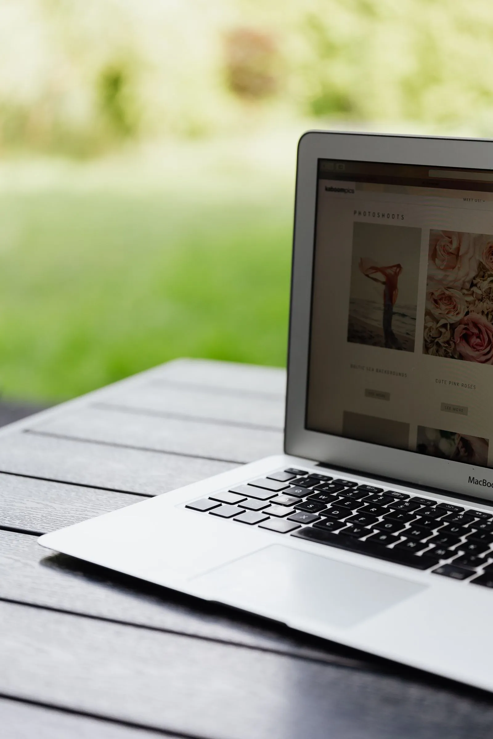Open laptop showing a company website — checking the source rather than a syndicated copy