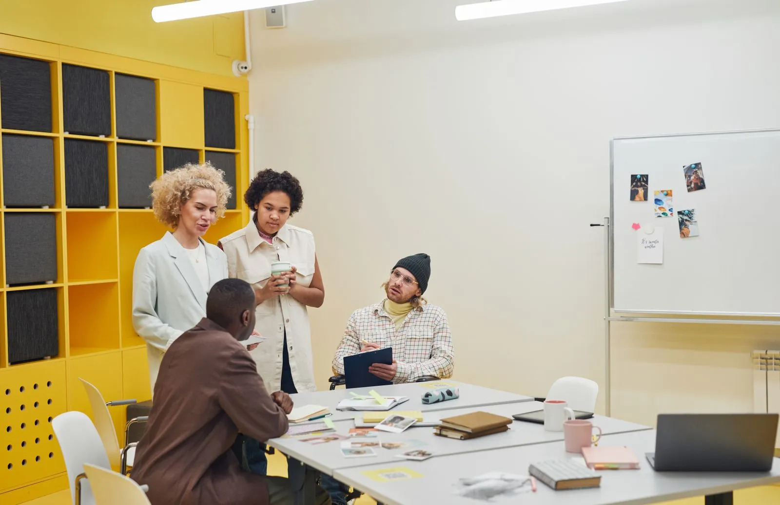 Team collaborating in a modern office — the companies worth targeting are often the ones not advertising