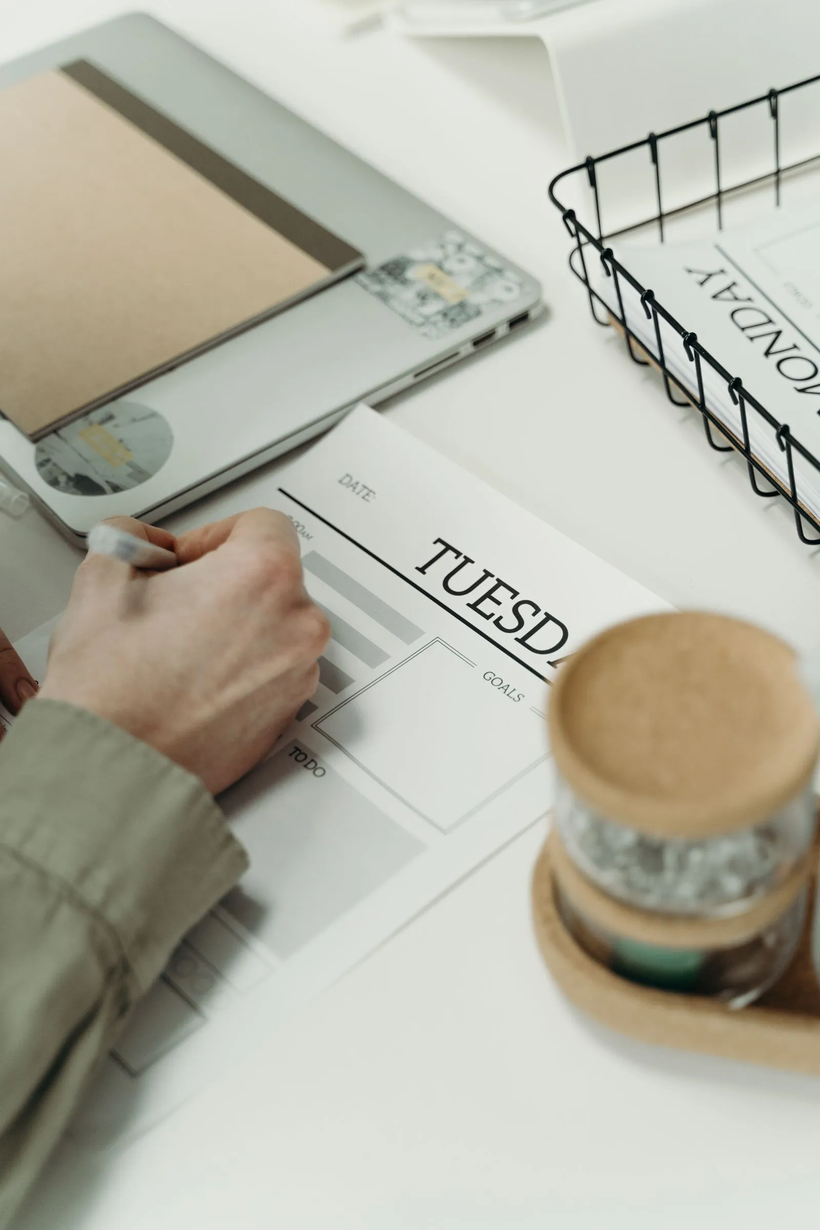 Planner with weekly tasks — a target list turns job hunting into a fifteen-minute weekly routine