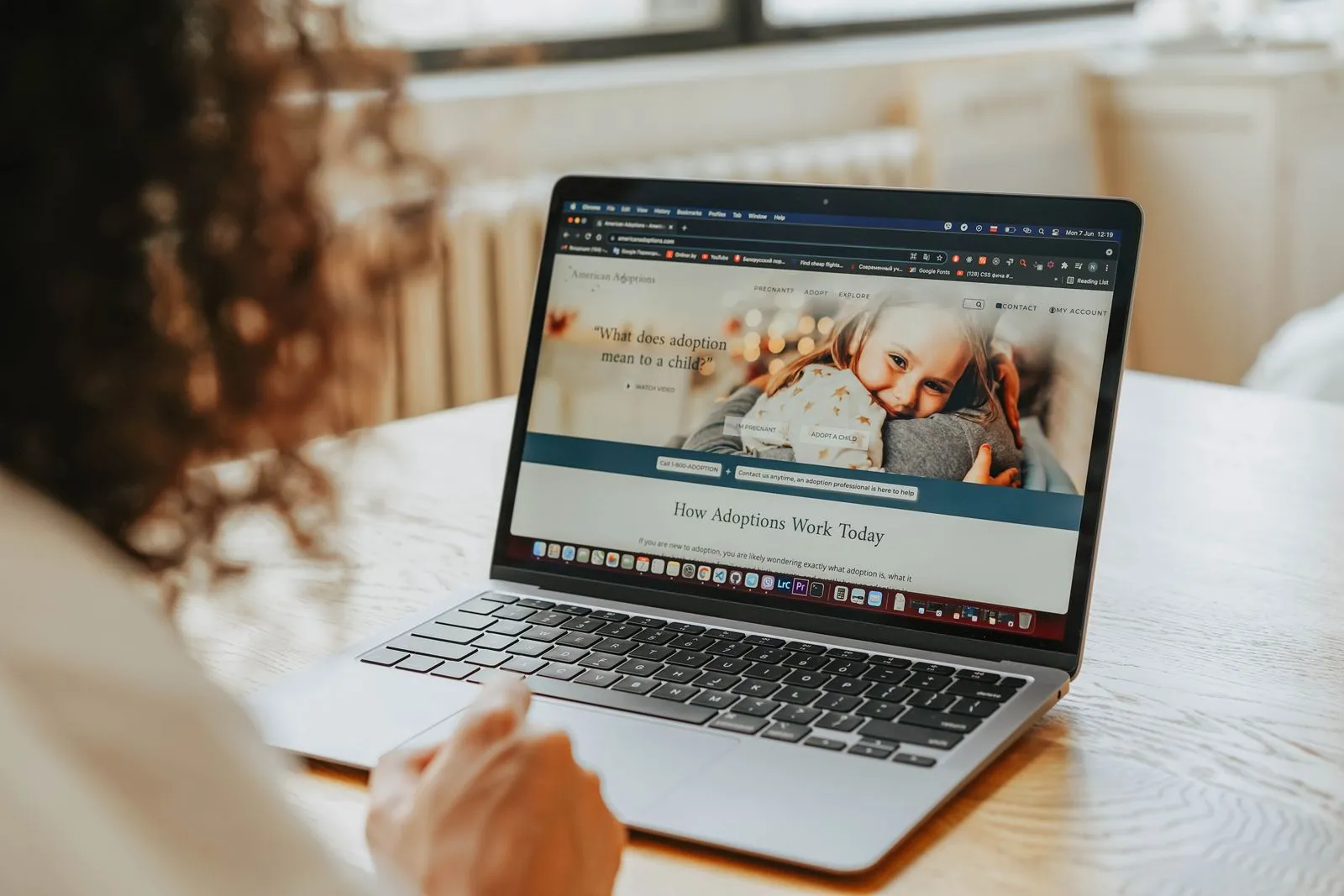 Researching companies and open roles on a laptop — unadvertised jobs are public, just not syndicated